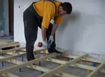 Як зробити регульовану підлогу на лагах своїми руками